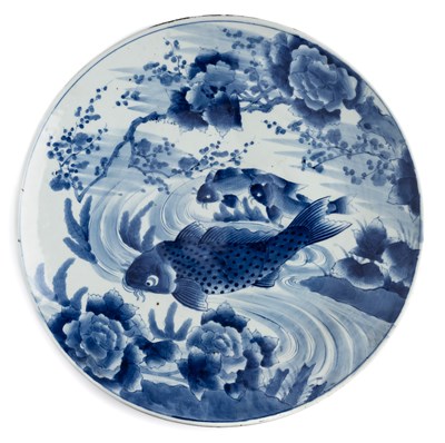 Lot 125 - A VERY LARGE JAPANESE ARITA BLUE AND WHITE 'CARP' CHARGER, MEIJI PERIOD (1868-1912)