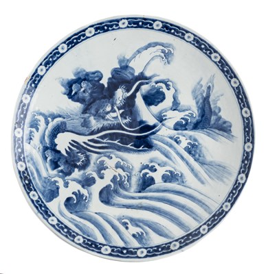 Lot 123 - A VERY LARGE JAPANESE ARITA BLUE AND WHITE 'DRAGON' CHARGER, MEIJI PERIOD (1868-1912)