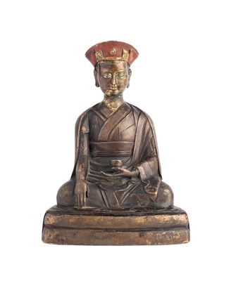 Lot 535 - A BRONZE FIGURE OF A KARMAPA LAMA, TIBET, 19TH CENTURY OR EARLIER