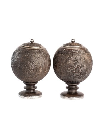 Lot 732 - A PAIR OF CARVED COCONUT VESSELS, INDIA, 19TH CENTURY