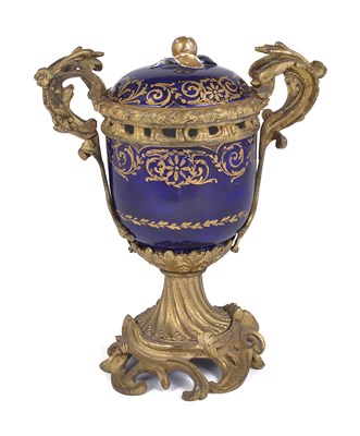 Lot 31 - A GILT-BRONZE-MOUNTED SEVRES BOWL AND COVER