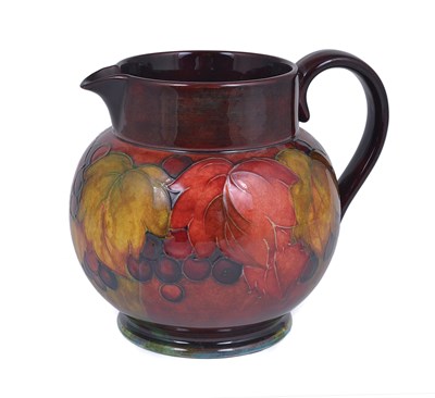 Lot 49 - LEAF AND BERRY: A MOORCROFT FLAMBÃ‰ JUG