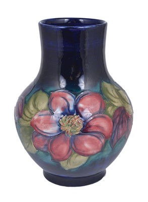 Lot 55 - CLEMATIS: A MOORCROFT BALUSTER VASE