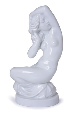 Lot 63 - A DANISH PORCELAIN FIGURE OF A FEMALE NUDE