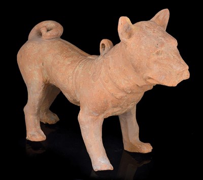 Lot 101 - TWO SMALL HAN STYLE POTTERY MODELS OF A BOAR AND AN OX AND A LARGER MODEL OF A DOG