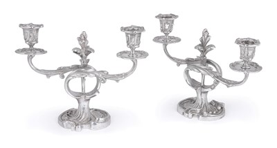 Lot 124 - A PAIR OF SILVERED BRONZE DWARF CANDELABRA