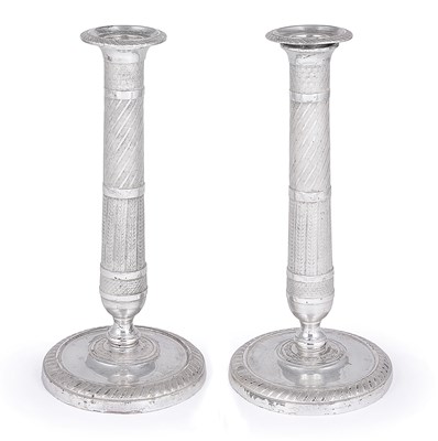 Lot 125 - A PAIR OF SILVERED BRASS CANDLESTICKS