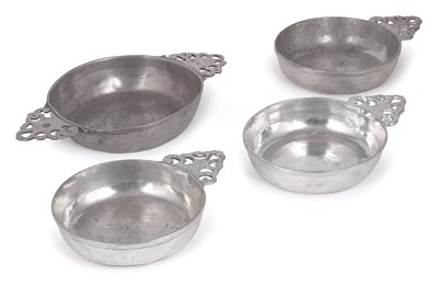 Lot 127 - A SET OF THREE FRENCH PEWTER SINGLE-HANDLE PORRINGERS