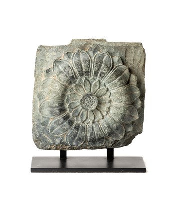 Lot 561 - A SMALL GANDHARA GREY SCHIST CARVED PANEL DEPICTING A LOTUS, NORTH-WEST PAKISTAN, 3RD/4TH CENTURY