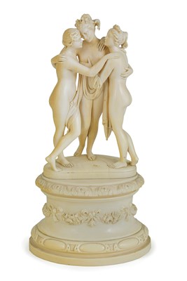 Lot 139 - A FRENCH CARVED IVORY GROUP OF 'THE THREE GRACES' ON SOCLE