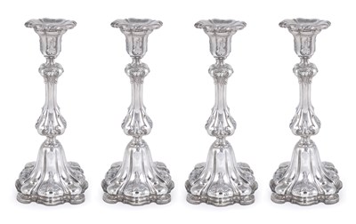 Lot 162 - A SET OF FOUR GERMAN SILVER CANDLESTICKS