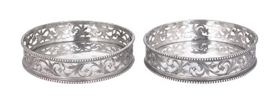 Lot 165 - A PAIR OF DUTCH SILVER WINE COASTERS