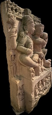 Lot 197 - A BUFF SANDSTONE RELIEF PANEL DEPICTING UMAMAHESVARA, CENTRAL INDIA, 11TH/12TH CENTURY