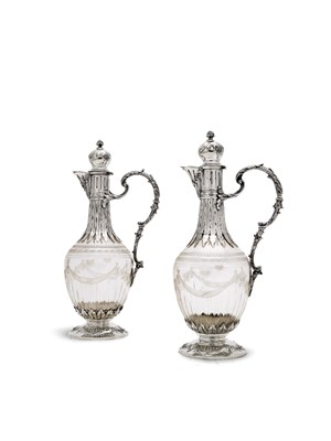 Lot 176 - A PAIR OF FRENCH SILVER-MOUNTED CLARET JUGS