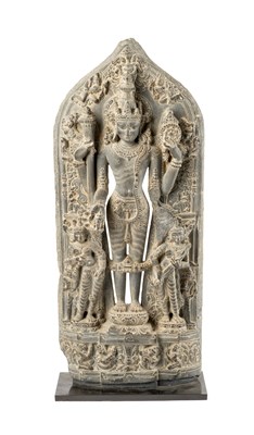 Lot 199 - A PALA BLACK STONE STELE DEPICTING VISHNU, BENGAL, EASTERN INDIA, 11TH/12TH CENTURY