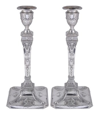 Lot 216 - A PAIR OF EDWARDIAN SILVER CANDLESTICKS