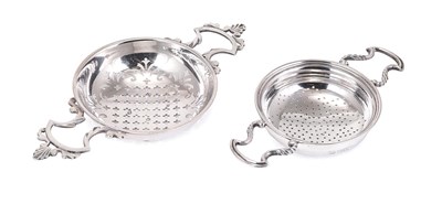 Lot 253 - A GEORGE II SILVER LEMON STRAINER