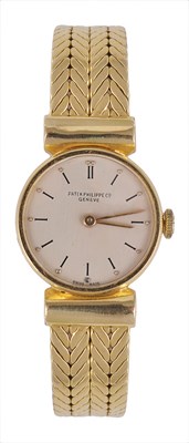 Lot 285 - PATEK PHILIPPE: A LADY'S GOLD WRISTWATCH WITH ASSOCIATED BRACELET