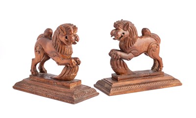 Lot 655 - A PAIR OF SMALL CARVED WOOD LIONS, MYSORE, SOUTHERN INDIA, LATE 19TH CENTURY