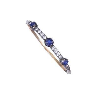 Lot 310 - SAPPHIRE AND DIAMOND BANGLE