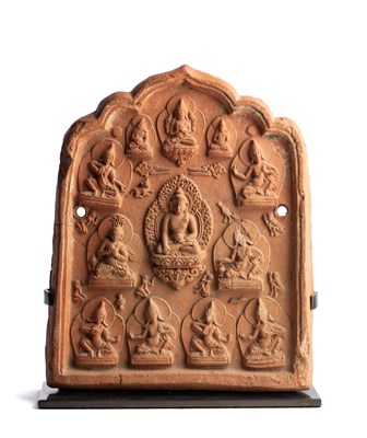 Lot 528 - A BUDDHIST DEVOTIONAL RELIEF PLAQUE (TSA-TSA), TIBET, PROBABLY 17TH/18TH CENTURY