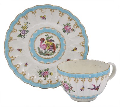 Lot 13 - A WORCESTER TEACUP AND SAUCER