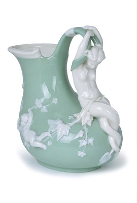 Lot 24 - A MINTON CELADON AND WHITE GLAZED PARIAN 'MERMAID EWER'