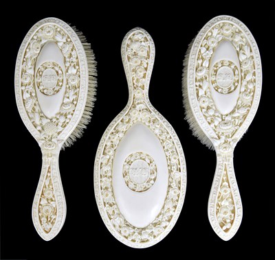 Lot 89 - A CHINESE IVORY HAND MIRROR AND PAIR OF HAND BRUSHES