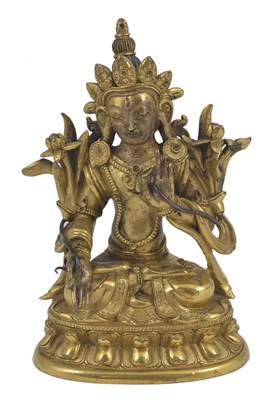 Lot 90 - A CHINESE GILT-BRONZE FIGURE OF TARA