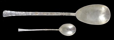 Lot 140 - A HAND BEATEN SILVER SPOON