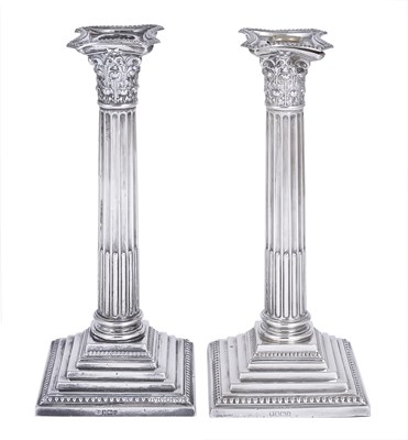 Lot 205 - A PAIR OF EDWARDIAN SILVER CANDLESTICKS