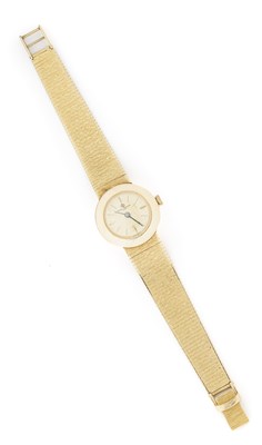 Lot 237 - BAUME & MERCIER: LADY'S  GOLD BRACELET WATCH, 1970s