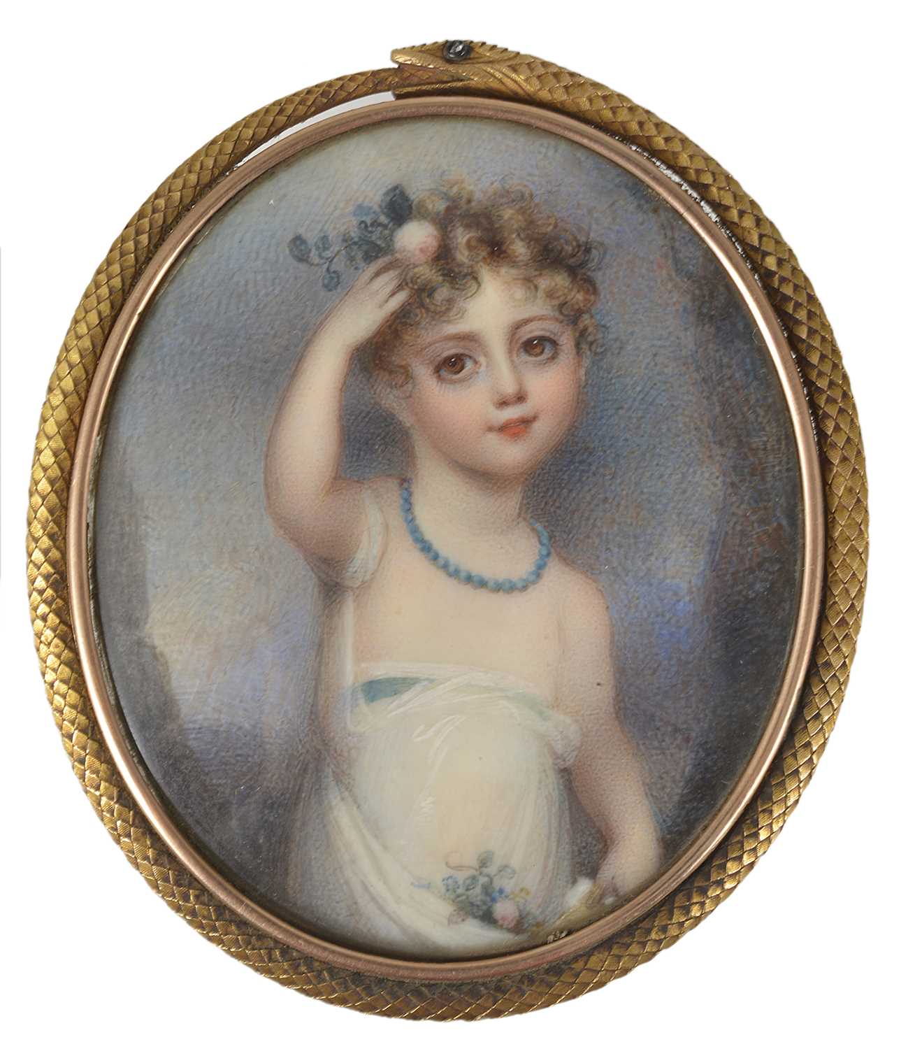 Lot 307 - A PORTRAIT MINIATURE OF A YOUNG GIRL