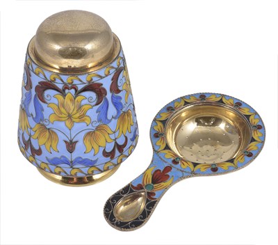 Lot 333 - A SOVIET RUSSIAN GILT AND ENAMEL JAR AND COVER AND A TEA STRAINER