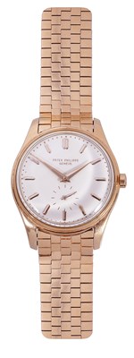 Lot 347 - PATEK PHILIPPE, REF. 2526: A RARE ROSE GOLD GENTLEMAN'S BRACELET WATCH