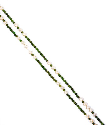 Lot 387 - CULTURED PEARL AND JADE LONG CHAIN