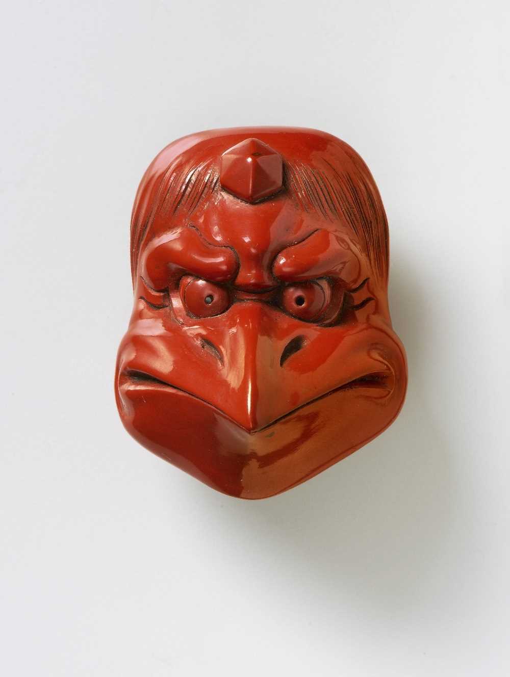 Lot 174 - A JAPANESE MASK NETSUKE OF KARASU-TENGU