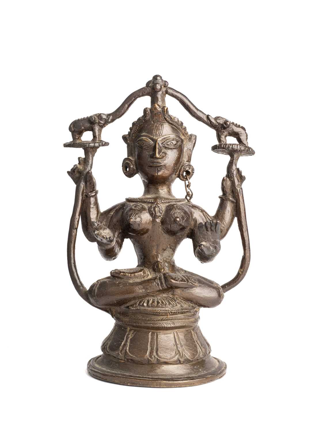 Lot 621 - A BRONZE FIGURE OF GAJALAKSHMI, ORISSA (ODISHA), EASTERN INDIA, CIRCA 1900