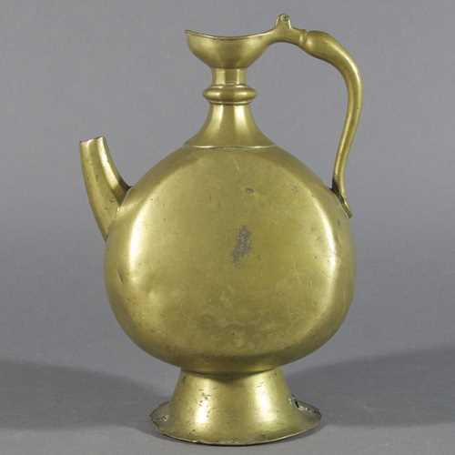 Lot 303 - A MUGHAL BRASS EWER