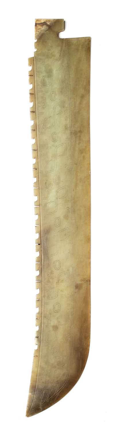 Lot 68 - A LARGE CHINESE ARCHAISTIC CEREMONIAL JADE BLADE