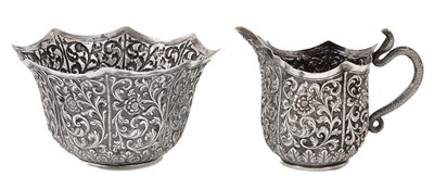 Lot 74 - AN INDIAN SILVER MILK JUG AND SUGAR BOWL