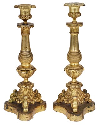 Lot 90 - A PAIR OF CONTINENTAL GILT-BRONZE CANDLESTICKS