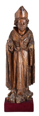 Lot 95 - â€¡A FIGURE OF A BISHOP SAINT