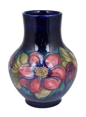 Lot 106 - A MOORCROFT 'CLEMATIS' BALUSTER VASE