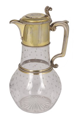 Lot 204 - A VICTORIAN SILVER-GILT-MOUNTED CLARET JUG