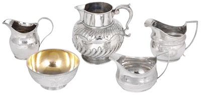 Lot 219 - THREE GEORGIAN SILVER MILK JUGS