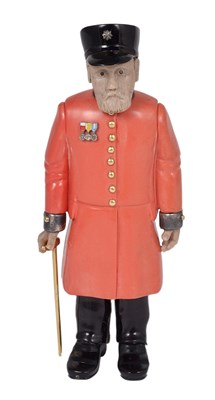 Lot 240 - A RUSSIAN STYLE CARVED HARDSTONE FIGURE OF A CHELSEA PENSIONER