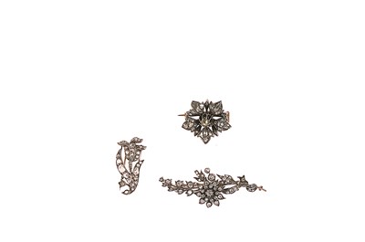 Lot 382 - THREE DIAMOND FLORAL BROOCHES