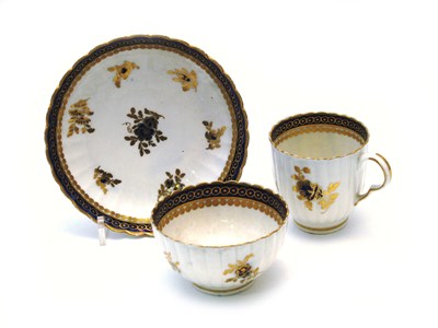 Lot 19 - A WORCESTER TEACUP AND SAUCER