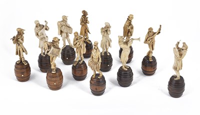 Lot 54 - A BAND OF TWELVE IVORY MUSICIANS